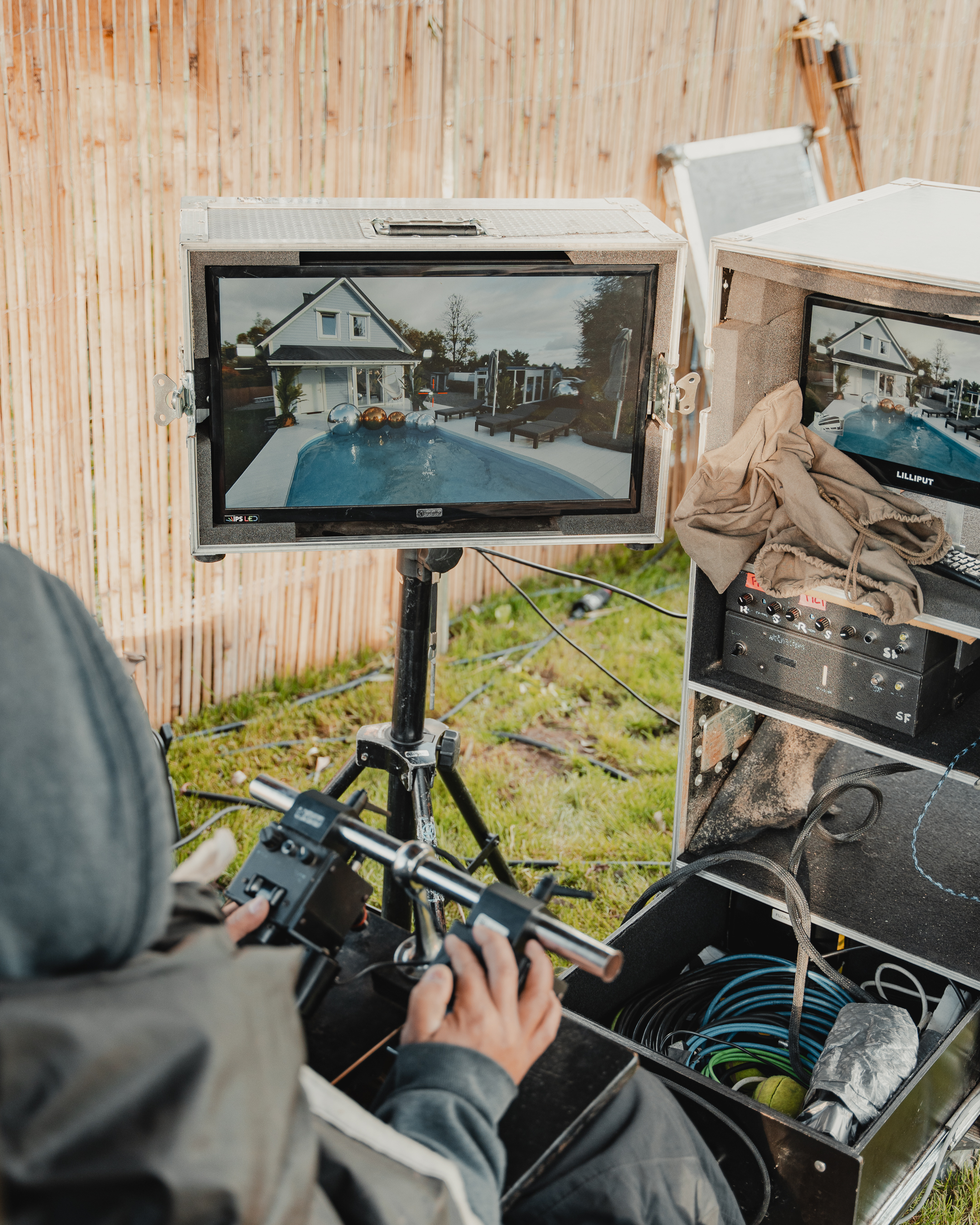 On-location filming setup with monitors